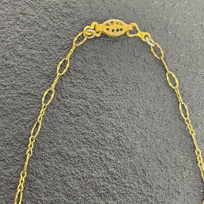 VINTAGE ORNATE GOLD TONED NECKLACE W/ AMBER COLORED STONE