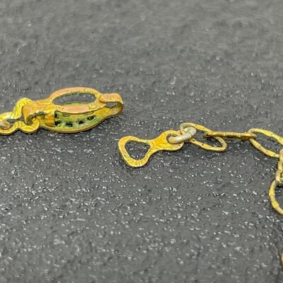 VINTAGE ORNATE GOLD TONED NECKLACE W/ AMBER COLORED STONE
