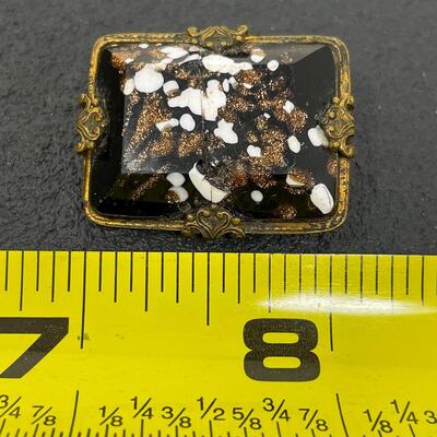 VINTAGE BLACK SPECKLED STONE BROOCH