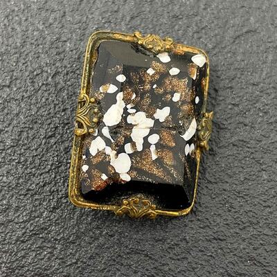 VINTAGE BLACK SPECKLED STONE BROOCH