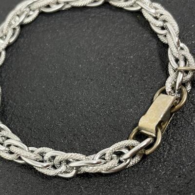 VINTAGE SILVER TONED BRACELET W/ PURPLE STONE