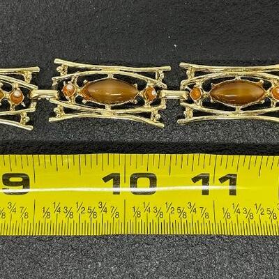 VINTAGE GOLD TONED PANEL BRACELET W/ ORANGE STONES