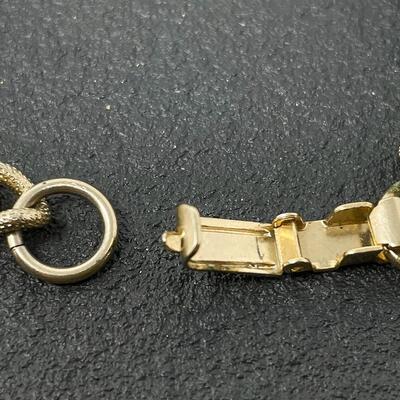 VINTAGE GOLD TONED CHARM BRACELET - MUSIC INSTRUMENTS & STONES
