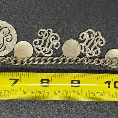 VINTAGE SILVER TONED CHARM BRACELET