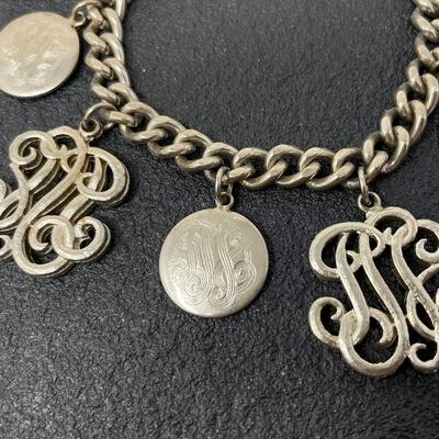 VINTAGE SILVER TONED CHARM BRACELET