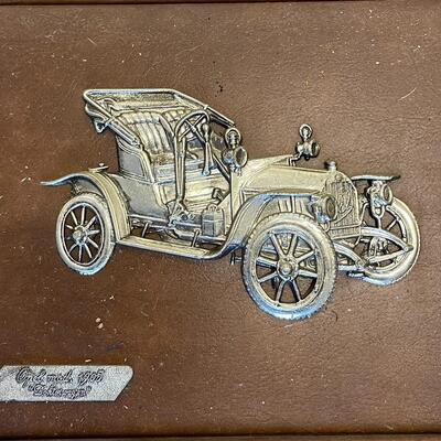 Vintage Leather framed metal Cars