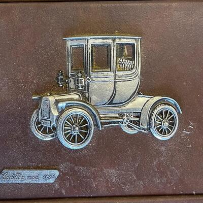 Vintage Leather framed metal Cars