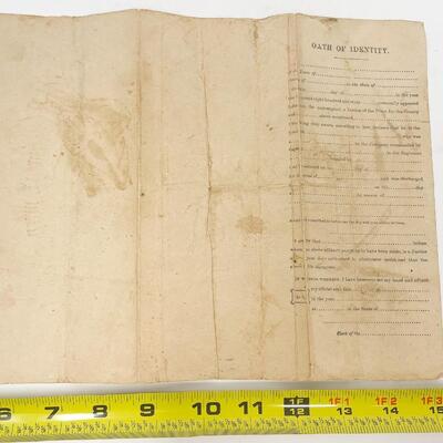 1865 CIVIL WAR DISCHARGE PAPER & 1910 INVALID VOUCHER - JAMES STEPHENS, MINNESOTA INFANTRY 8TH REGIMENT COMPANY F