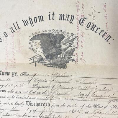 1865 CIVIL WAR DISCHARGE PAPER & 1910 INVALID VOUCHER - JAMES STEPHENS, MINNESOTA INFANTRY 8TH REGIMENT COMPANY F