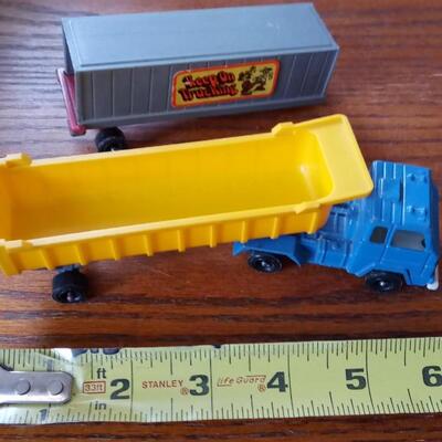 LOT 33  VINTAGE TOOTSIE TRUCK AND TWO TRAILERS