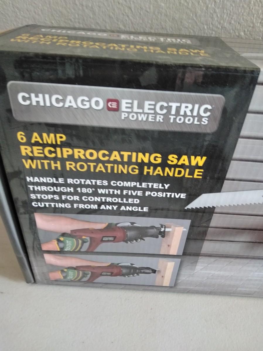 LOT 169 NEW CHICAGO ELECTRIC RECIPROCATING SAW WITH BLADES