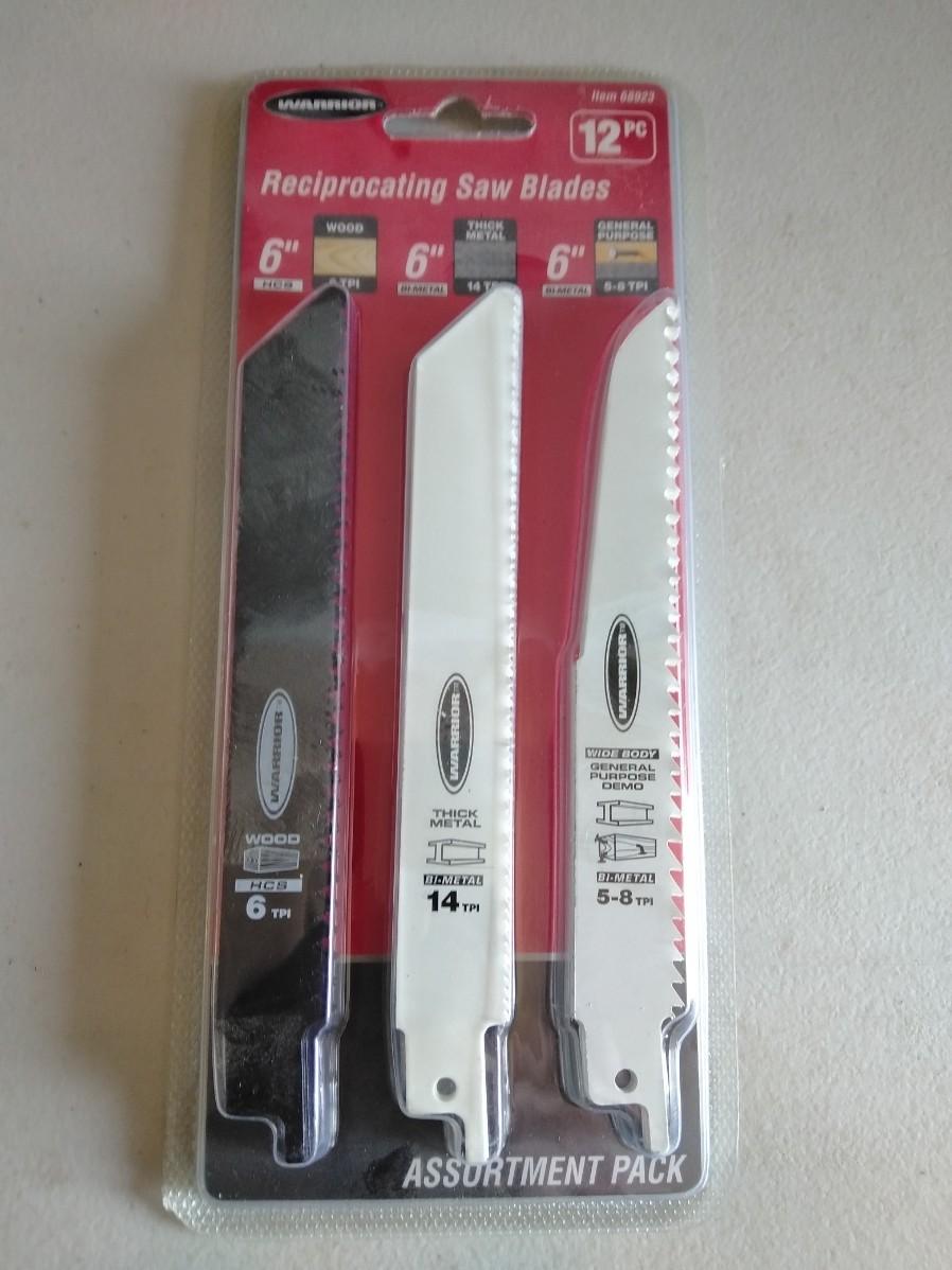 LOT 169 NEW CHICAGO ELECTRIC RECIPROCATING SAW WITH BLADES