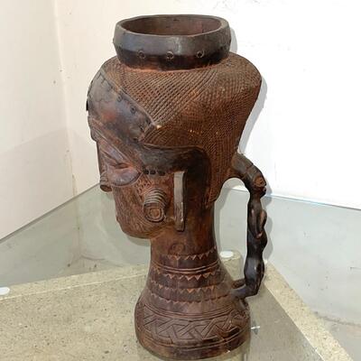 LOT 19  CARVED AFRICAN CEREMONIAL VESSEL W/ FIGURAL  HANDLE