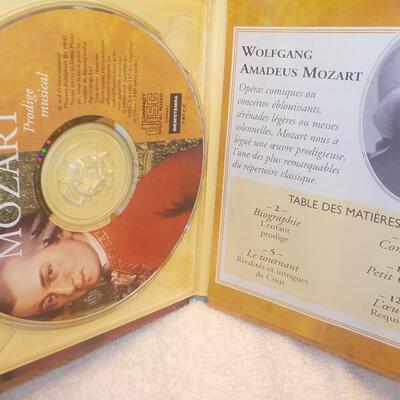 Johann Strauss and Wolfgang Mozart CD's with dozens of great hits.