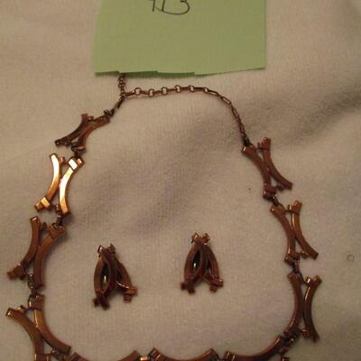 Bronze colored necklace and earrings
