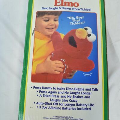 Tickle Me Elmo by Tyco for Ages 1 1/2 and up - Used