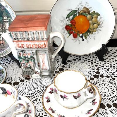 Lot 131 Decorative Plates (2) + Le Bistro Teapot + 3 Bone China Cups & Saucers England