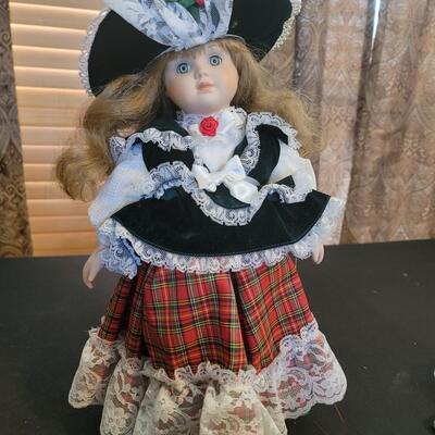 Porcelain Doll on stand