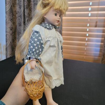 Porcelain doll with basket