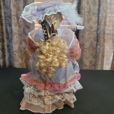 Beautiful porcelain Stand up doll with flowers