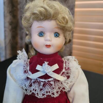 Beautiful porcelain Doll in red