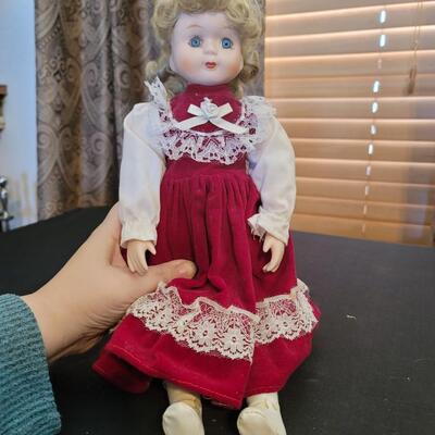 Beautiful porcelain Doll in red