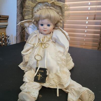 Beautiful porcelain Angel doll with Bible