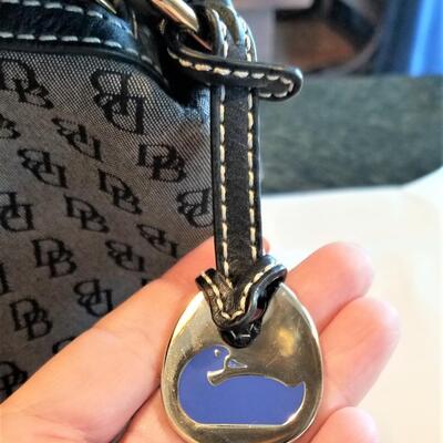Lot #37  Nice Dooney & Bourke Handbag with Registration Card