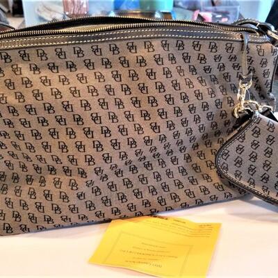 Lot #37  Nice Dooney & Bourke Handbag with Registration Card