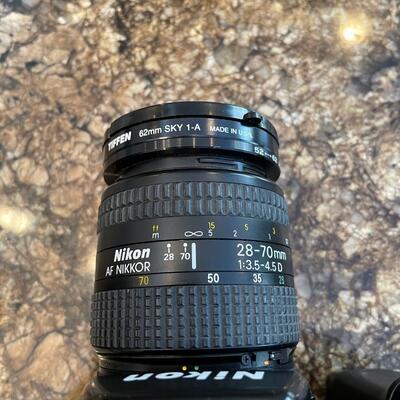 35 MM Nikon N90S Camera with two lenses, 28-70mm and 70-210mm, plus external flash SB-26 and carrying bag