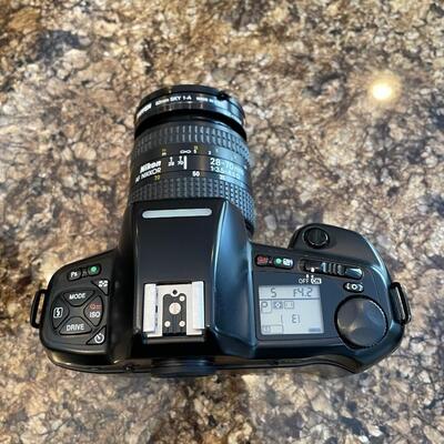 35 MM Nikon N90S Camera with two lenses, 28-70mm and 70-210mm, plus external flash SB-26 and carrying bag