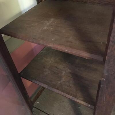 Antique display case with shelves