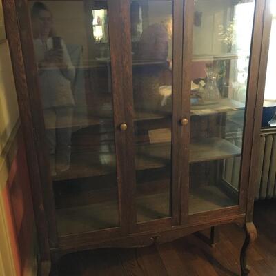 Antique display case with shelves