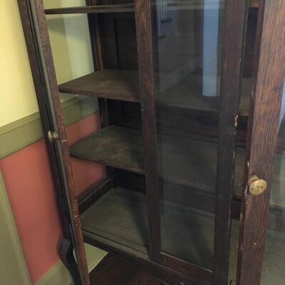 Antique display case with shelves