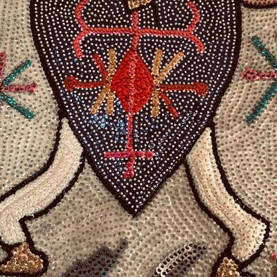Sequined wall hanging