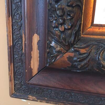 Carved wood wall mirror