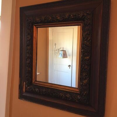 Carved wood wall mirror