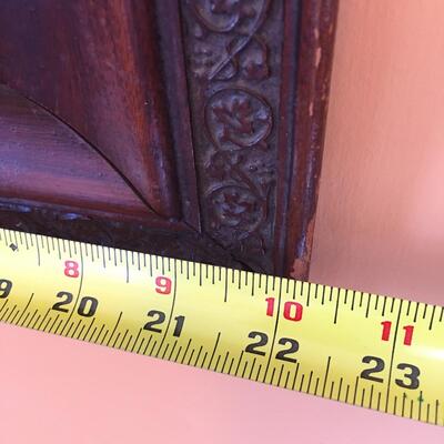Carved wood wall mirror
