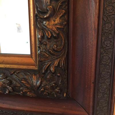 Carved wood wall mirror
