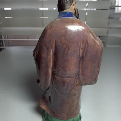 Vintage 8in tall Chinese man with scroll