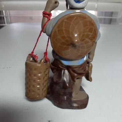 Vintage 5.5in tall Chinese man with basket