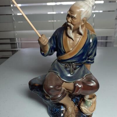 Vintage 7.5 in tall chinese man sitting
