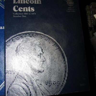 LOT 53  COIN COLLECTORS BOOKS WITH A FEW PENNIES IN ONE BOOK