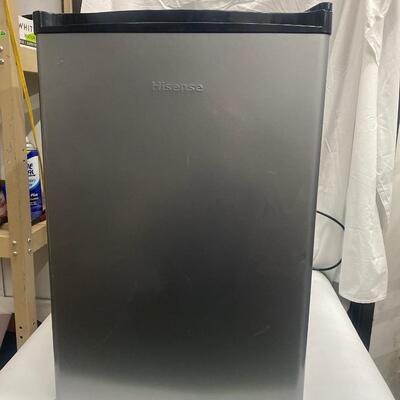B5 Hisense mini fridge with small freezer, has a sticky part, and could use a cleaning. Works great!