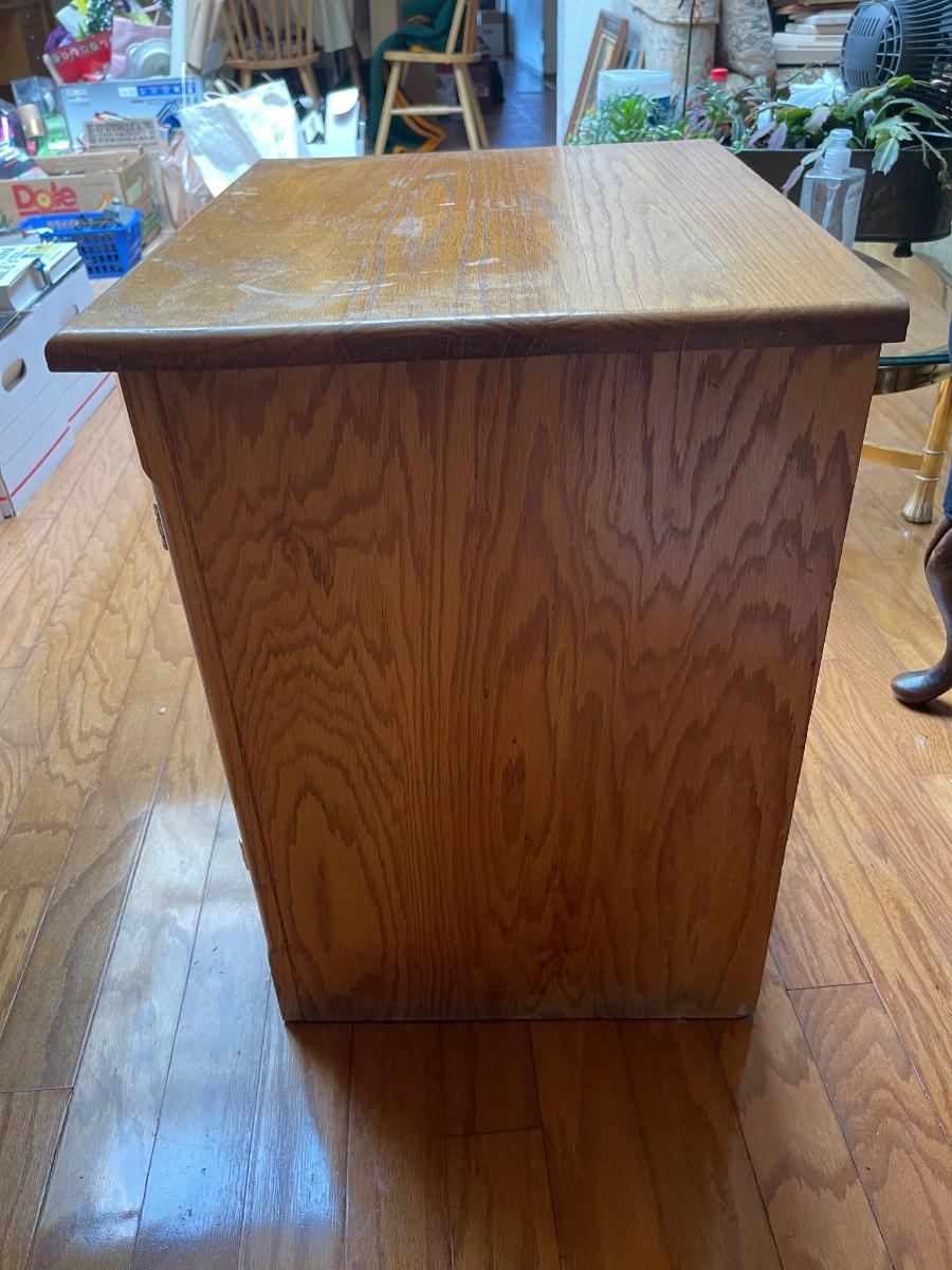 Repurposed oak ice box storage