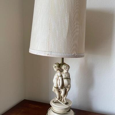 Vintage lamp with three children at base