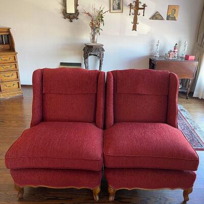 A pair of Red Lounge Chairs