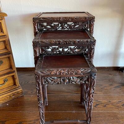 Highly. Carved Chinese nesting tables