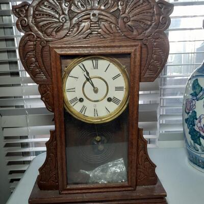 Antique Wind up wood and brass clock