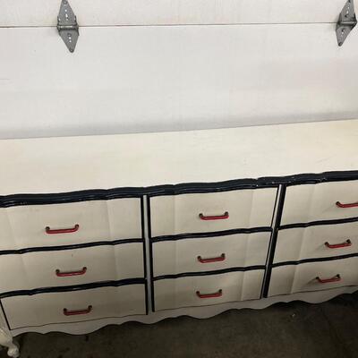 B8 dresser with 9 drawers, has wear and needs repainting. 18â€ d, 69 1/4 w, 32.5 tall